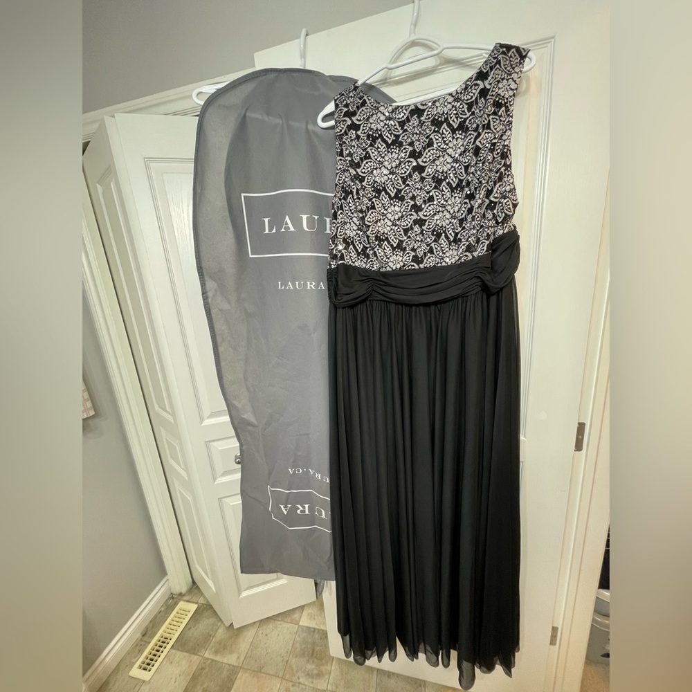 Purchased at Laura worn two times to work events. Excellent condition.